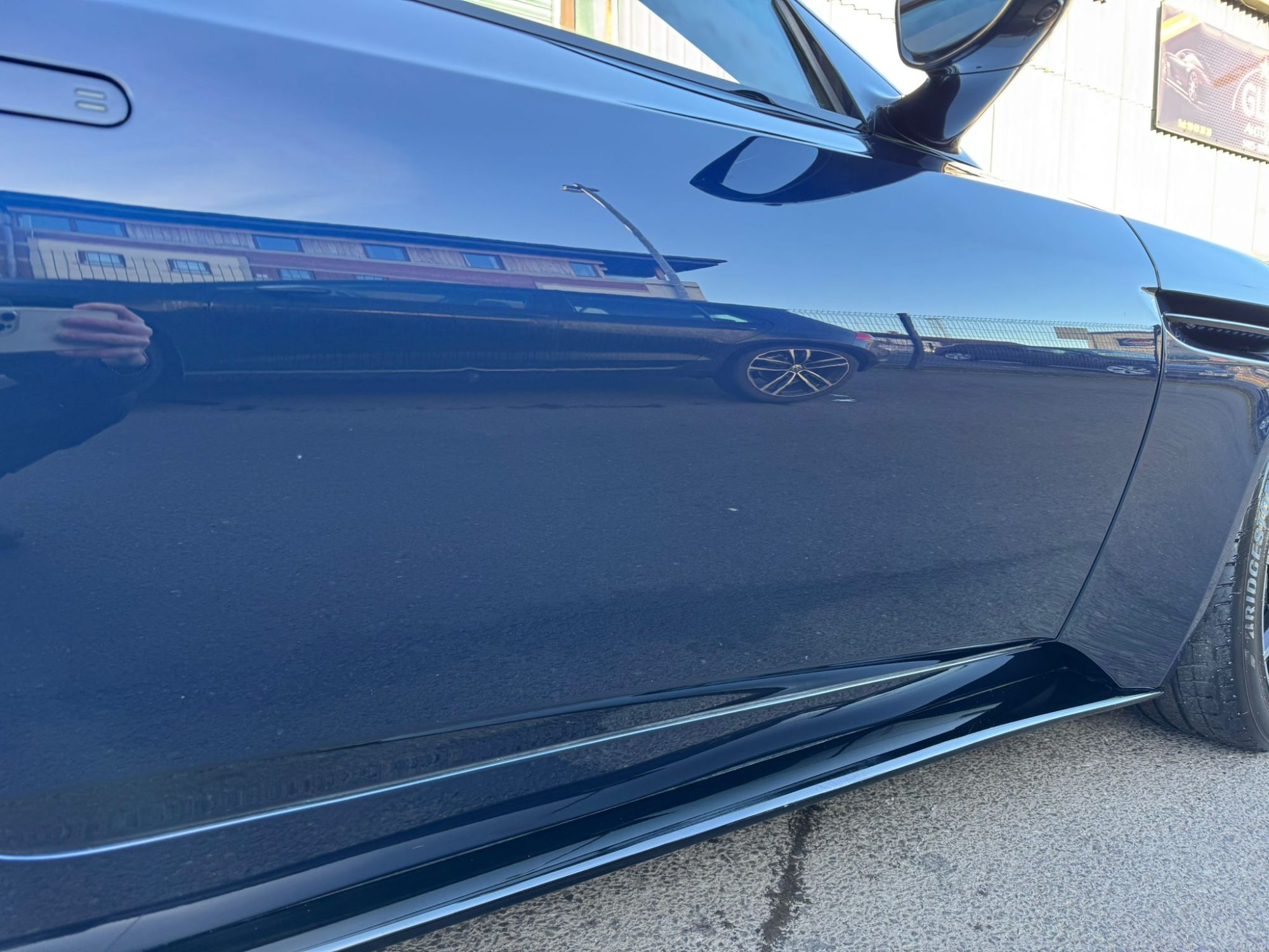 Paint touch up on an Aston Martin at TJC Detailing & Valeting in Belfast