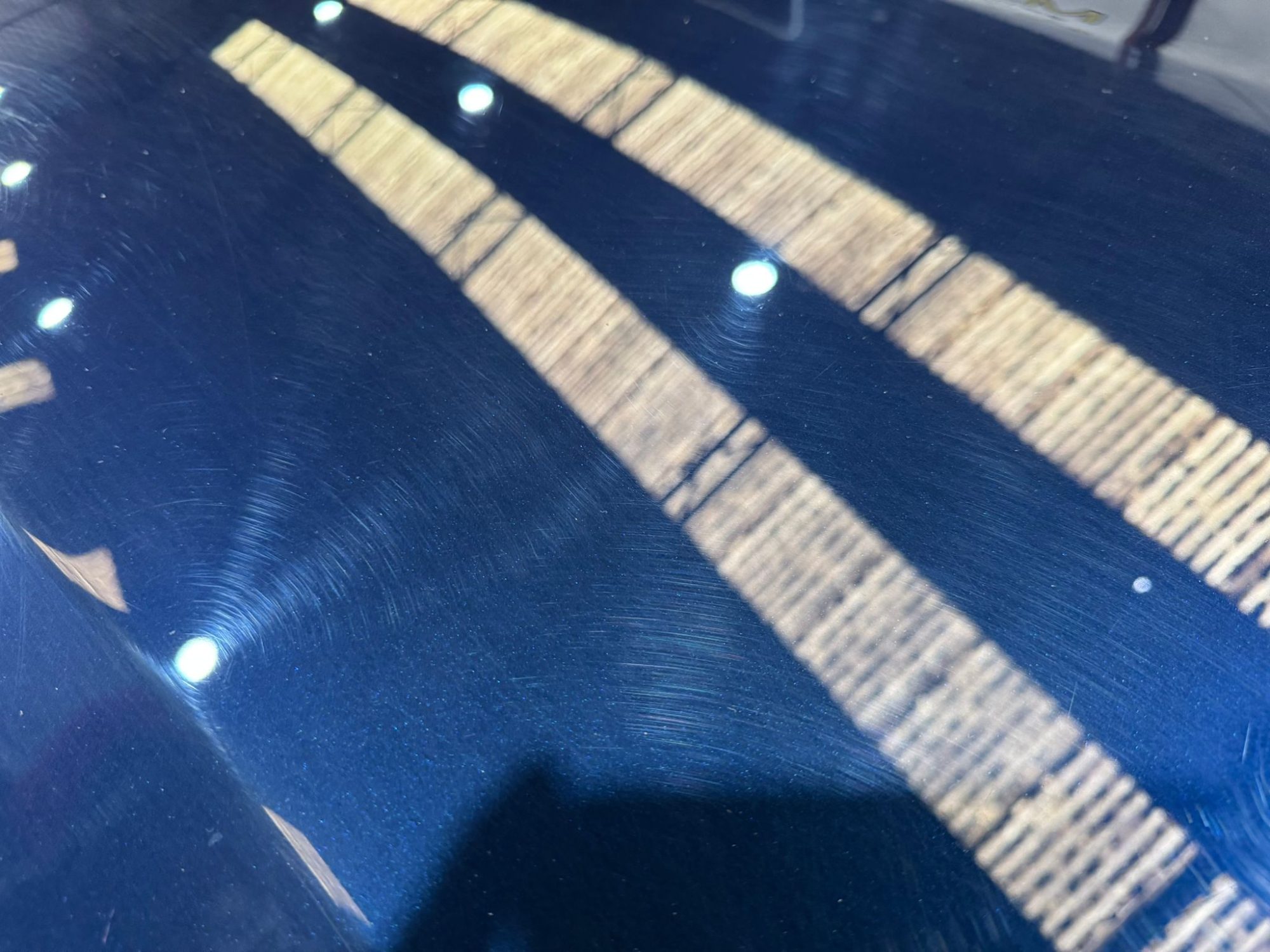 Scratch marks on an Aston Martin at TJC Detailing & Valeting in Belfast