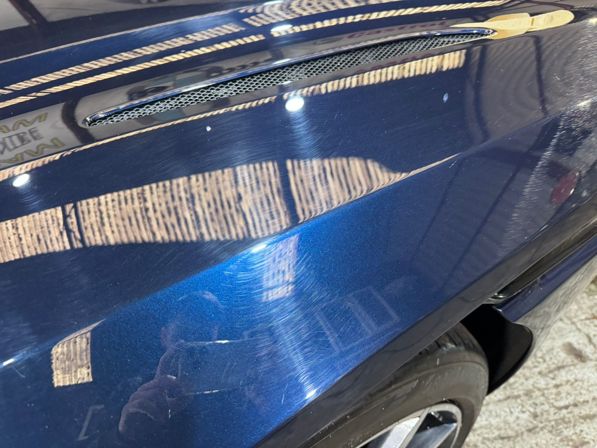 Aston Martin before scratch removal at TJC Detailing & Valeting in Belfast