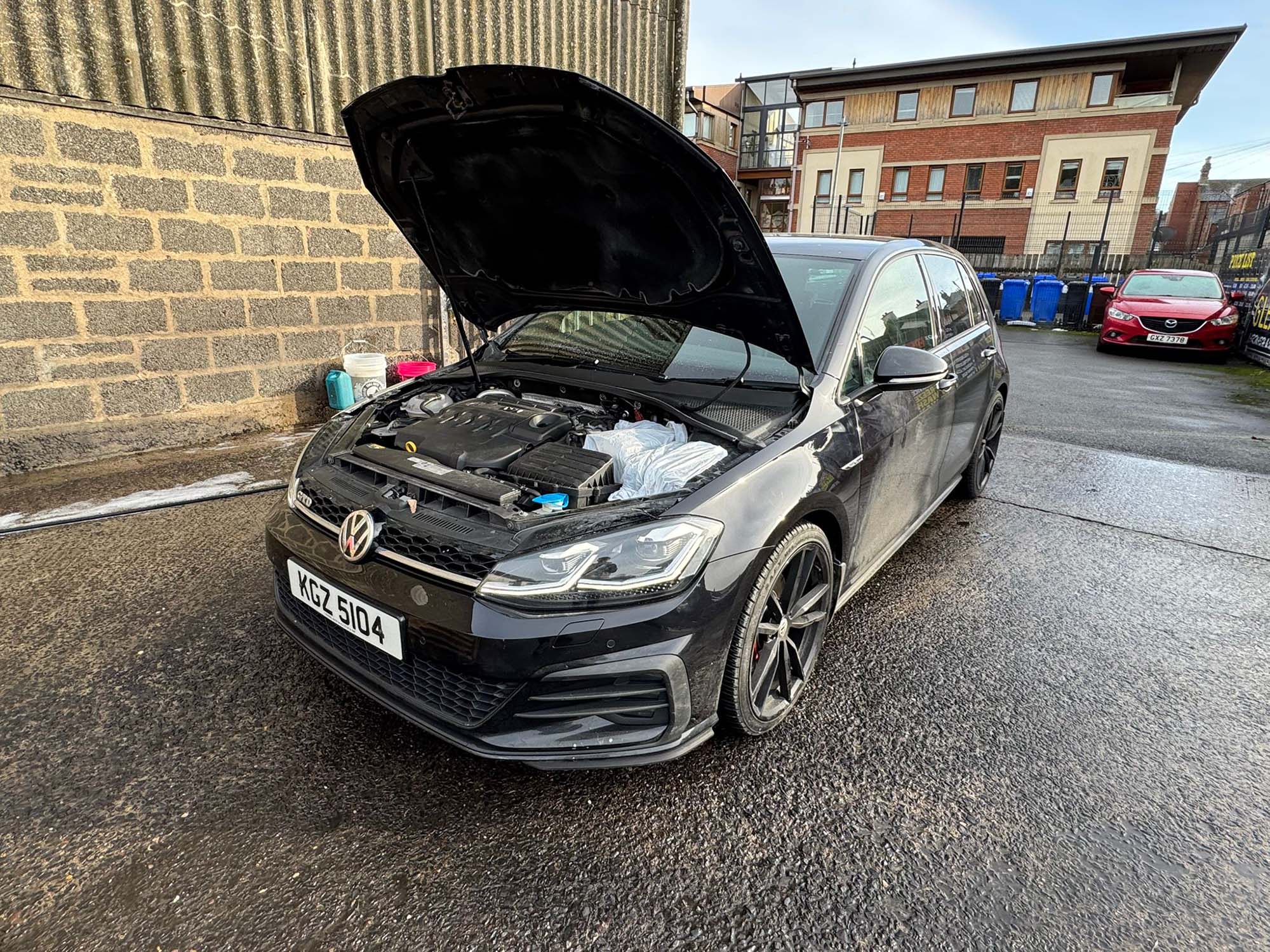 Engine bay cleaning on a Volkswagen Golf at TJC Detailing & Valeting in Belfast